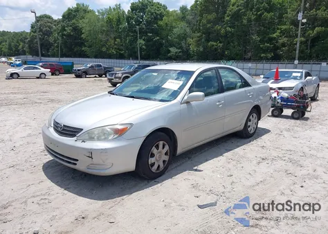 2003 Toyota Camry Le z USA, uszkodzony, nr VIN 4T1BE32KX3U698653